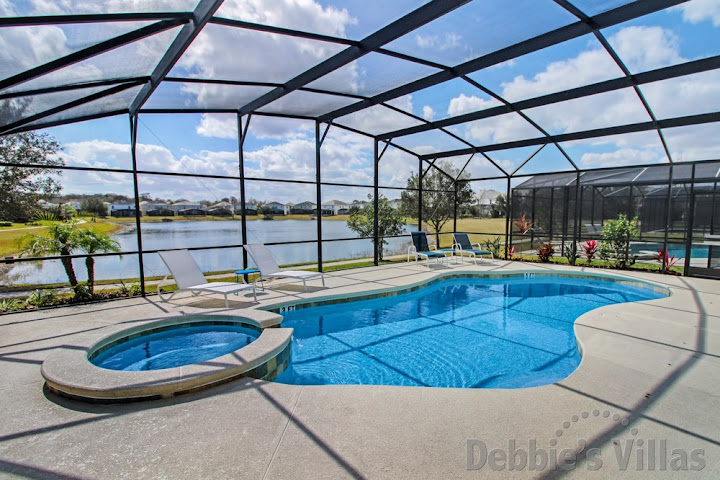 Bella Vida villa in Kissimmee with a lake view from the southwest-facing private pool