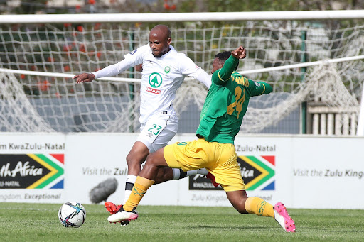 Xola Mlambo of AmaZulu is challenge by Nqobeko Dlamini of Golden Arrows in the DStv Premiership match at Sugar Ray Xulu Stadium in Durban on September 22 2021.