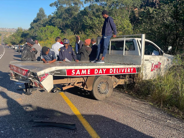 The taxi crashed into this vehicle which had stopped in the emergency lane to report a hit and run accident.