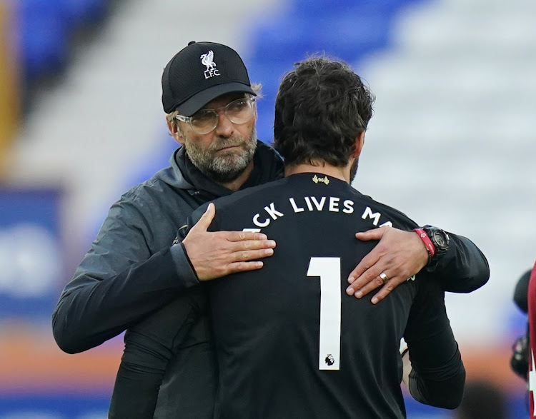 Liverpool manager Jurgen Klopp with goalkeeper Alisson