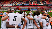 The Toyota Cheetahs director of rugby Franco Smith speaks to his players during the Guinness Pro14 match between Munster and Toyota Cheetahs at Thomond Park on September 01, 2018 in Munster, Ireland. 
