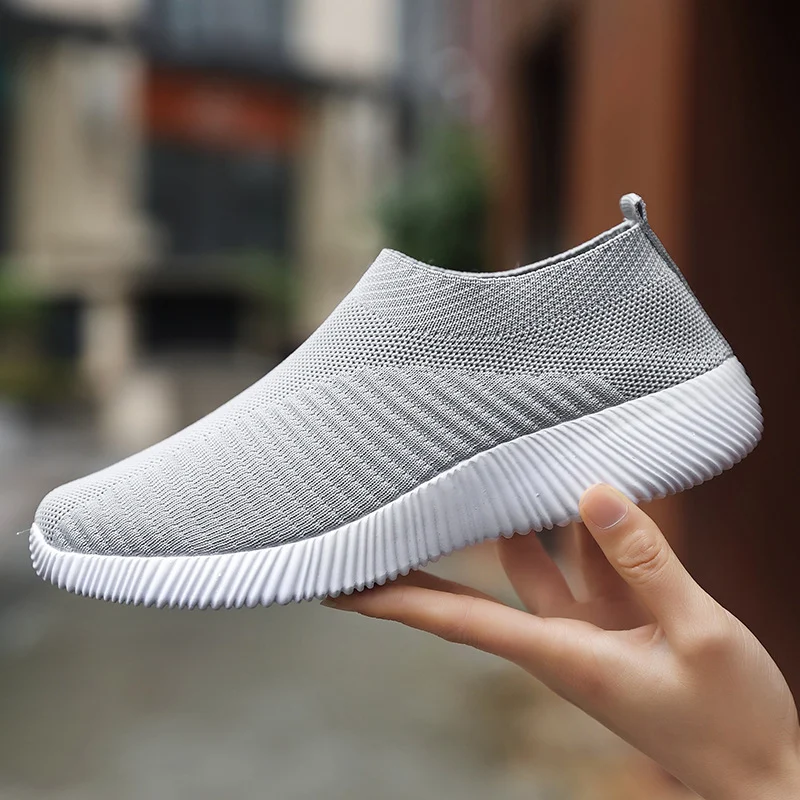 Ademende Stretch Mesh Platte Schoenen Zachte Zool Fly Knit Instappers. Comfortabel, lichtgewicht en ideaal voor dagelijks gebruik.