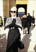 TRIUMPH: Jackie Burger in a Makhetha design under the Arc de Triomphe