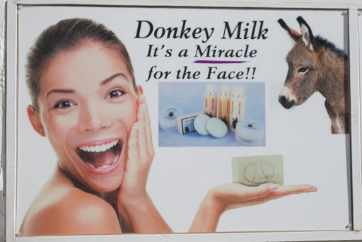 Donkey-Milk-billboard.jpg - Really? I didn't know that. A billboard in Oia, Santorini.