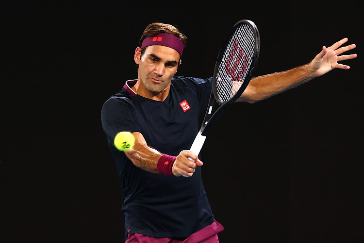 Switzerland's Roger Federer in action at the Australian Open yesterday