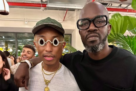 Black Coffee with Pharell Williams at his debut fashion show in Paris.