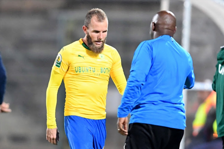 Mamelodi Sundowns coach Pitso Mosimane speaks to striker Jeremy Brockie during the Caf Champions League match against Horoya AC at Lucas Moripe Stadium on August 28, 2018 in Pretoria, South Africa.