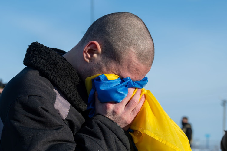 A Ukrainian prisoner of war reacts after arriving at an unknown location in Ukraine, January 31 2024. Picture: UKRAINE PRESIDENTIAL PRESS SERVICE/REUTERS