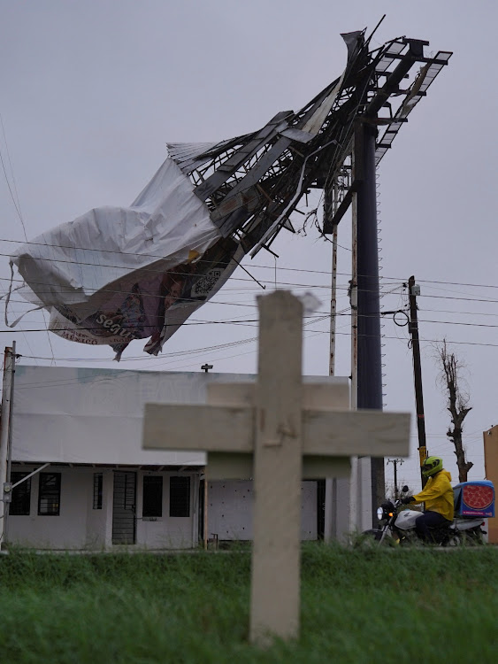 A collapsed billboard is pictured as Tropical Storm Hilary hits Baja California state, in Mexicali, Mexico, August 20, 2023.