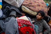 Palestinians fleeing Khan Younis, due to the Israeli ground operation, move towards Rafah, amid the ongoing conflict between Israel and the Palestinian Islamist group Hamas, in the southern Gaza Strip, January 27, 2024. 