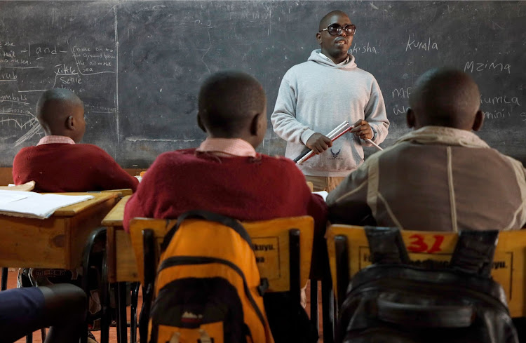 Kamau Mbugua during a session with standard eight candidates at Gitiba Primary School in Karen End on Monday