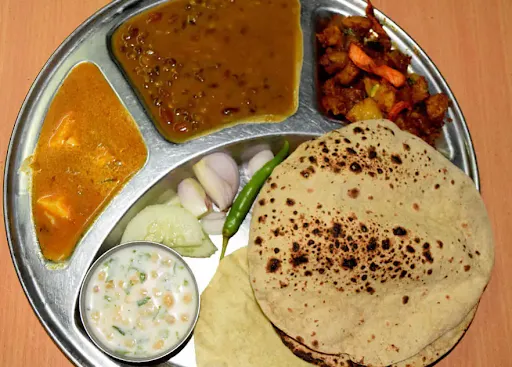 4 Roti + 2 Parathe + Special Punjabi Kadi Pakoda + Jeera Aloo + Dahi