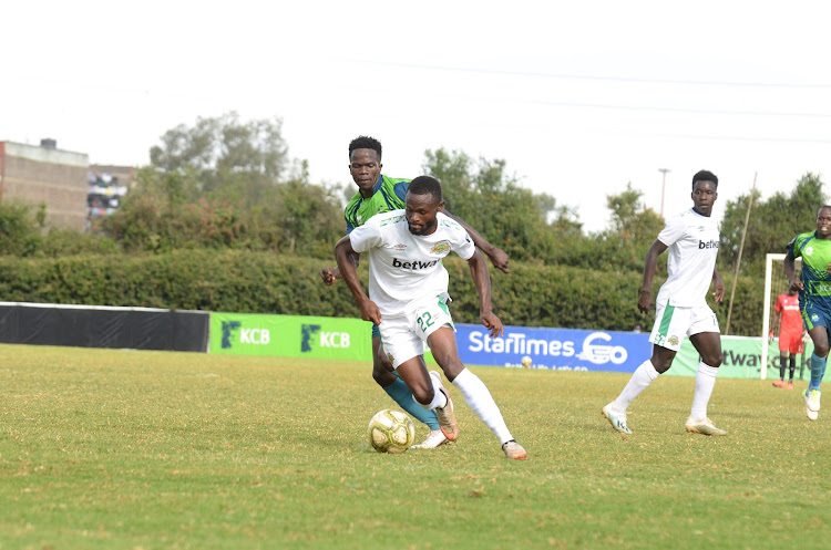 Julius Masaba of Kariobangi Sharks vies with Baraka Badi of KCB during their Betway Super Cup Round of 16 match at Utalii Grounds on Sunday.