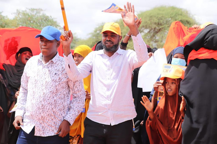 Wajir West ODM parliamentary aspirant Yussuf Farah with his supporters in Hadado, Wajir West while on a campaign trail.