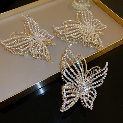 Title 4, Ladies Pearl Butterfly Alloy Grip provides secu...