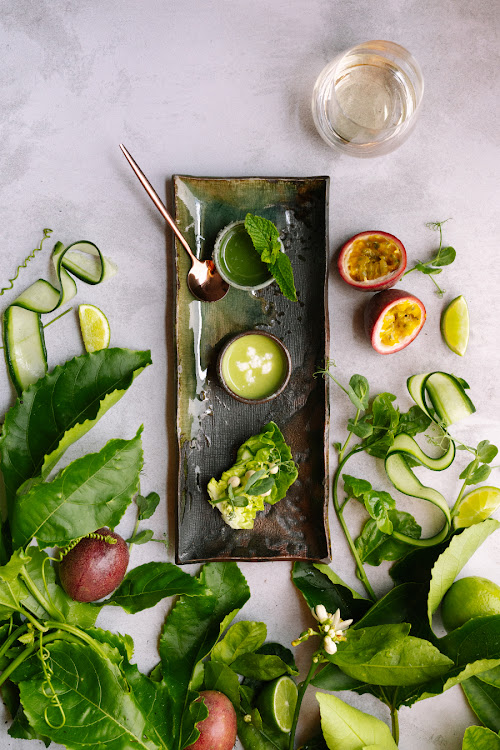 A taste of umami on Creation's summer menu: a mojito booster, yellow tomato gazpacho shot and a lettuce canapé.