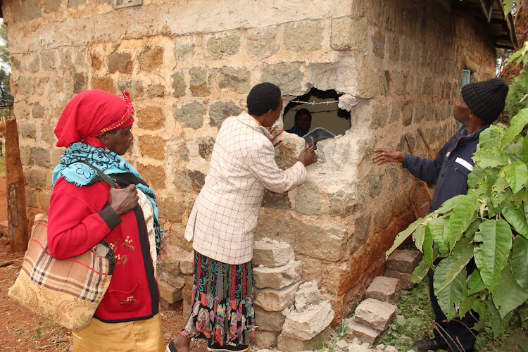 Ngangarithi area residents at the scene where attackers raided a homestead and destroyed property on Wednesday.