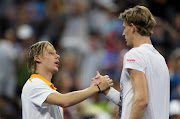 Kevin Anderson of South Africa shakes hands with Denis Shapovalov of Canada after their men's singles third round match against Denis Shapovalov of Canada on Day Five of the 2018 US Open at the USTA Billie Jean King National Tennis Center on August 31, 2018 in the Flushing neighborhood of the Queens borough of New York City. 