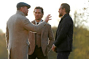 Guy Ritchie on the set of 'The Gentlemen' with Matthew McConaughey and Charlie Hunnam.