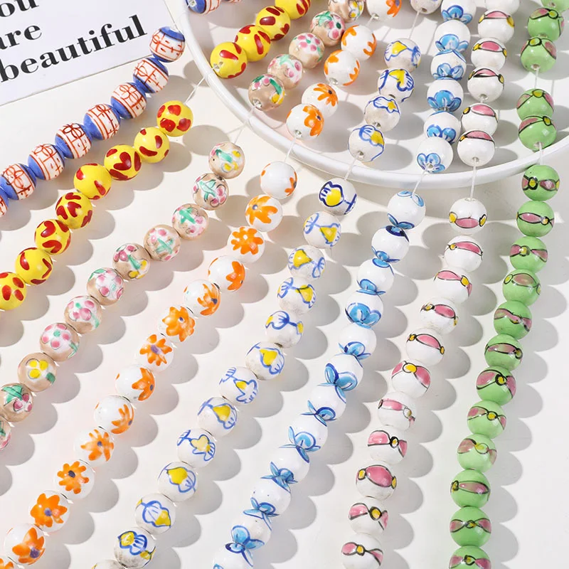Jolies perles éparpillées en céramique petites fleurs peintes à la main DIY. Créez vos propres bijoux et accessoires uniques!