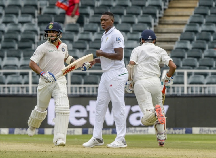 Virat Kohli and Cheteshwar Pujara of India in partnership during day 1 of the 3rd Sunfoil Test match between South Africa and India at Bidvest Wanderers Stadium on January 24, 2018 in Johannesburg.