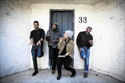 different vibe:
       Rorisang Thandekiso and MuzArt band mates - Victor Chauke, Jabu Junior
      
       and Sol Mosetle -
      
       pose for a portrait on a street in Rosebank, Johannesburg
      
      
        
      
      PHOTO: DANIEL  BORN