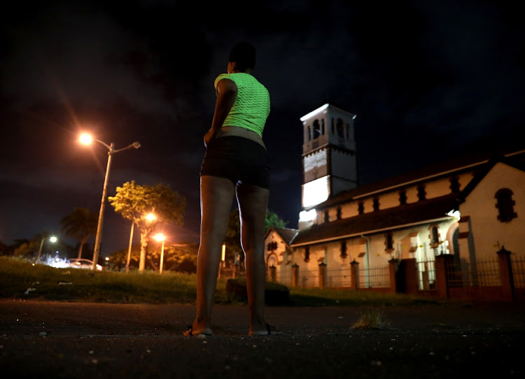 Leanne Steenkamp [not her real name] waits for clients behind St Mary's Church in Greyville, Durban.