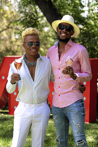 Radio and television personality Somizi Mhlongo and Mohale Motaung.