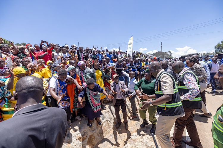 President William Ruto and Deputy President Rigathi Gachagua break into a dance with singers after the launch of development projects in Kericho County on March 14, 2024.