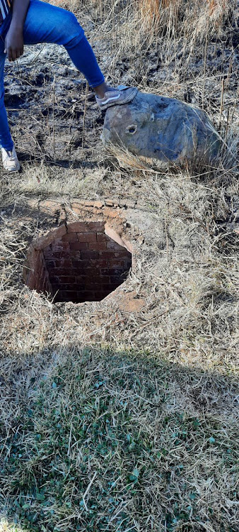 The search for a boy who fell into this manhole in Soweto on Sunday was called off on Monday evening. It will resume on Tuesday.