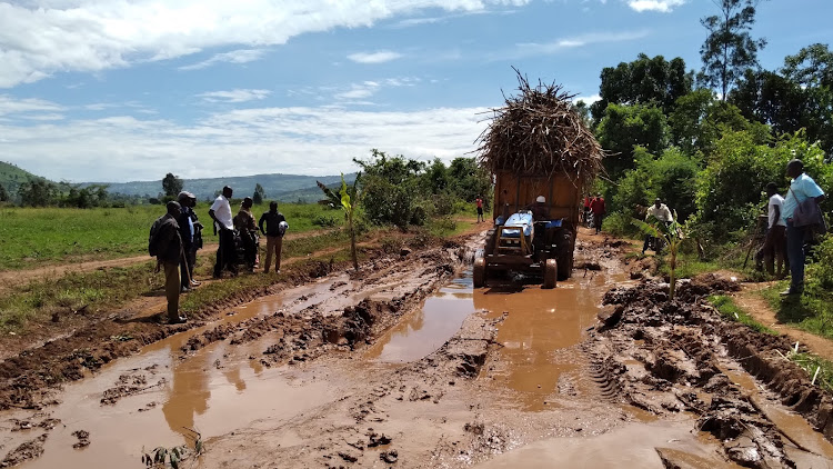 A tractor carrying cane to Nyanza region goes through a bad section of The Sikawa-Ogwedhi road in Sikawa area of Transmara West. Kamore residents in Naivasha area have decried the poor state of their roads.