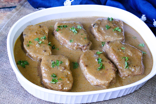 A casserole dish filled with No Bake Shake N Bake Pork Chops.