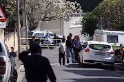 Police at the scene of the shooting of Advocate Pete Mihalik outside Reddam House Atlantic Seaboard in Green Point, Cape Town on 30 October 2018.