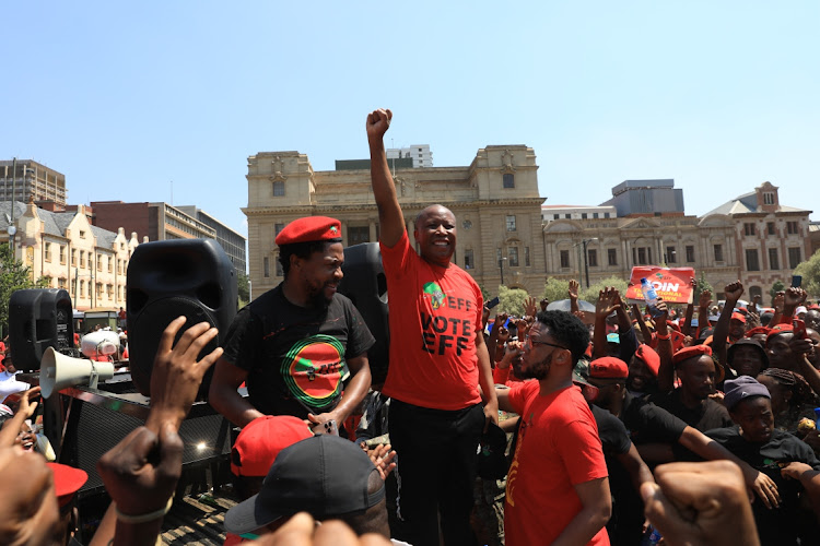 Julius Malema greets the crowd at Church Square, Pretoria.