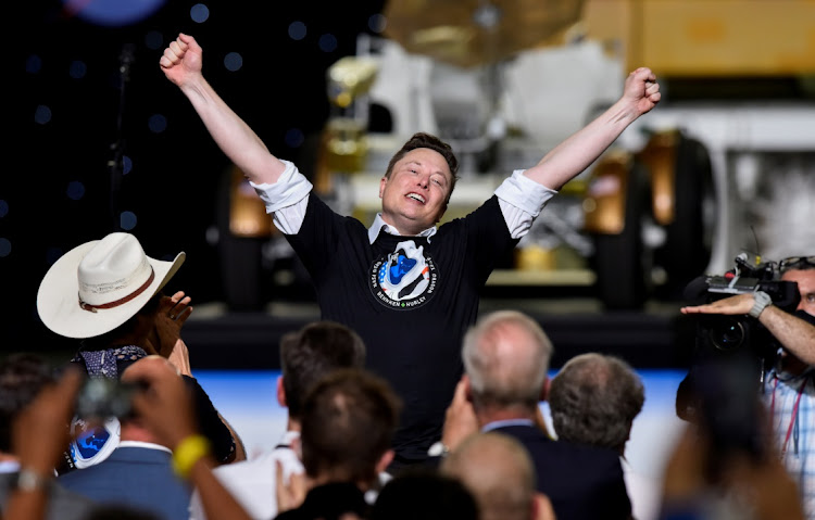 SpaceX CEO and owner Elon Musk celebrates after the launch of a SpaceX Falcon 9 rocket and Crew Dragon spacecraft on NASA's SpaceX Demo-2 mission to the International Space Station from NASA's Kennedy Space Center in Cape Canaveral, Florida, US May 30, 2020.