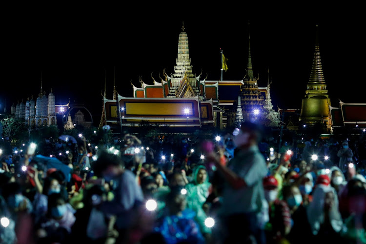 Pro-democracy protesters attend a rally to call for the ouster of Prime Minister Prayuth Chan-ocha's government and reforms in the monarchy, in Bangkok, Thailand earlier this month.