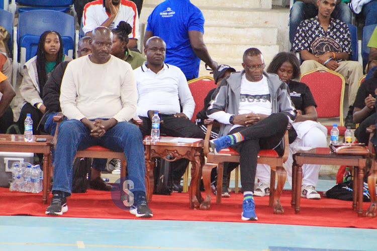 Kenya Basketball Federation Chairperson Paul Otula (left) and ICT CS Eliud Owalo follow the games at Ulinzi Sports Complex on May 12, 2024