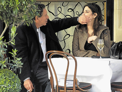 Art dealer Charles Saatchi, 70, shuts up his 53-year-old wife, celebrity chef Nigella Lawson, at a London restaurant. Other pictures show him with his hand around her throat