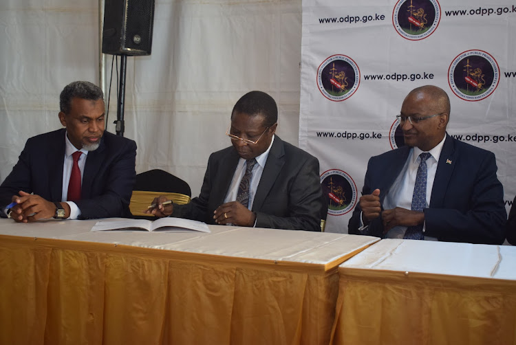 Director of Public Prosecution Noordin Haji, Immigration Director General Alexander Muteshi and Central Bank of Kenya Governor Patrick Njoroge during the launch of inter Agency guidelines on cooperation and collaboration in the investigation and prosecution of terrorism and terrorism financing at Prosecution training institue on April 12, 2022