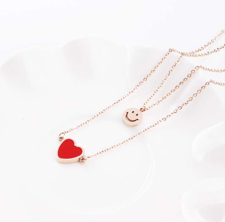 Korean version of the stylish titanium steel rose double love necklace red peach heart clavicle chain female short money