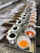 Honeybush tea samples in the laboratory.