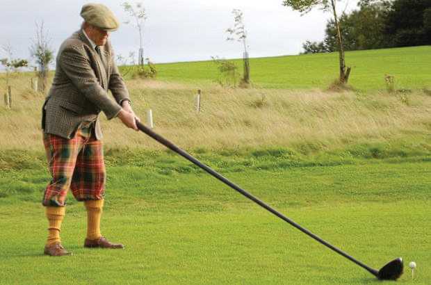 scottish-man-playing-golf-with-long-golf-club