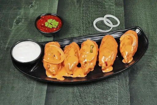 Classic Veg Schezwan Gravy Momos [4 Pieces]