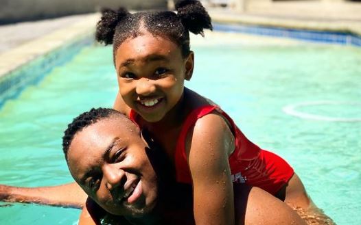 Shimza and his daughter enjoy some quality time in the pool.