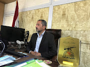 Mohammed Mohi, spokesman for Kataib Hezbollah paramilitary group attends an interview with Reuters in Baghdad, Iraq October 11, 2020. 