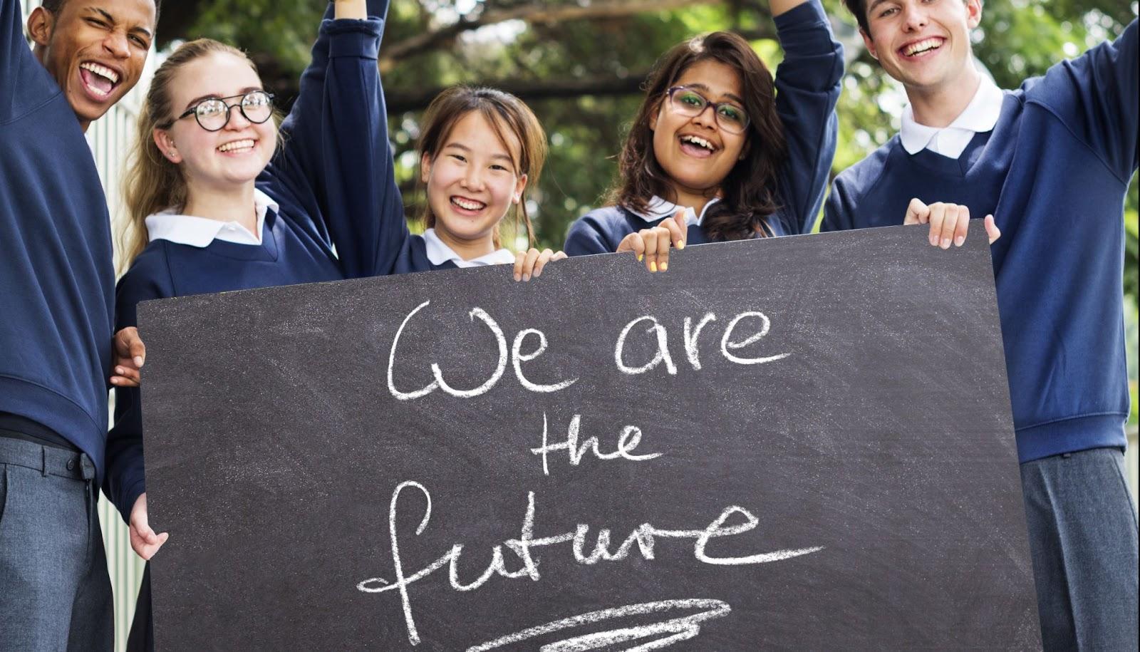 Students holding banner