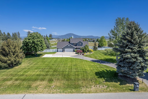 Modern house with large green lawn in this luxury property for sale in Post Falls ($1,275,000)