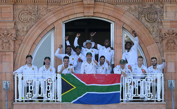 Dean Elgar and South African players celebrate on the balcony after they won the first Test against England at Lord's Cricket Ground on August 19, 2022 in London, England.