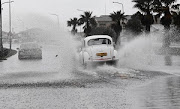 A street under water after heavy overnight rain in Athlone, Cape Town.  