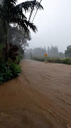 A flooded road is seen near the breached Kaupakalua dam, in Haiku on Maui, Hawaii, U.S. March 8, 2021 in this still image from social media video.  